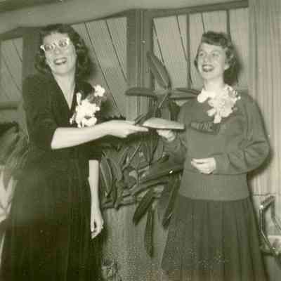 Mrs. Ruth Goodrich and Barb D'Polus at the Cheer Banquet at Barbus's on March 11, 1954.