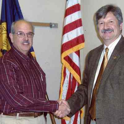 Dispatcher Paul Molin, City Manager John Zech