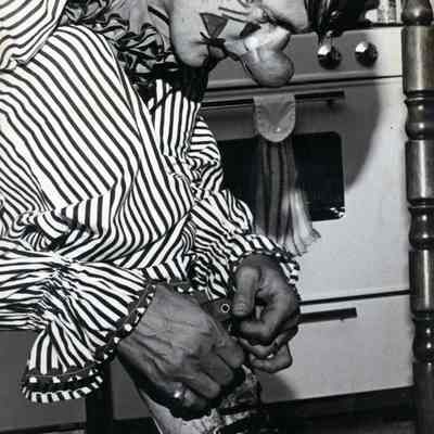 Clown Tying his Shoes