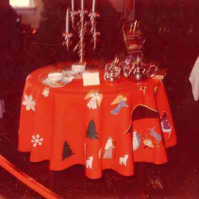 Table Cloth of Lillian Hawley. Setting was done by Betty Dryer.