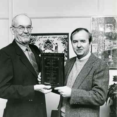 Mayor Pat Norton honors Wallace Arrowsmith on Dec. 26,1984.