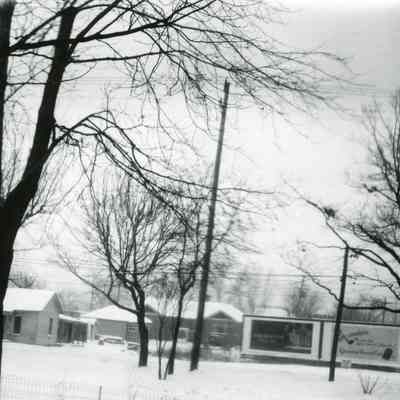 Looking north from Warner property, Michigan Avenue. Site of sign is 34438 Michigan Avenue. Later site of L.Georges Coney Island. House on left was moved to SE corner Sims and 4th to become St. Josephs Church Rectory. House is currently 34437 Sims. Small house in center is Cullen house.