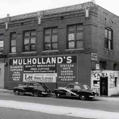1952. Michigan Ave side of Building, showing rear and Taxi building.