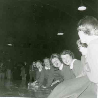 Sondra Anderle, Barb D'Polus, Barb Haughwout, Marilyn Johnson, Barb Apple, Donna Kuhn at 1954 Regionals at Yost Field House.