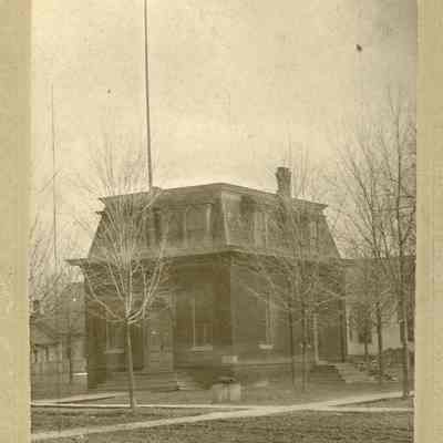 Early photo of Village Hall with Tall flagpole