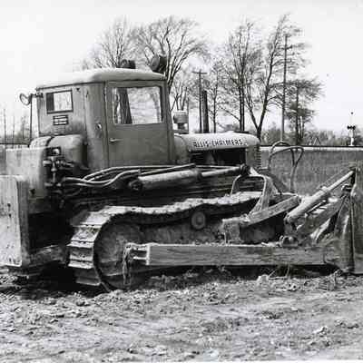 Bulldozer Pushes Garbage Level