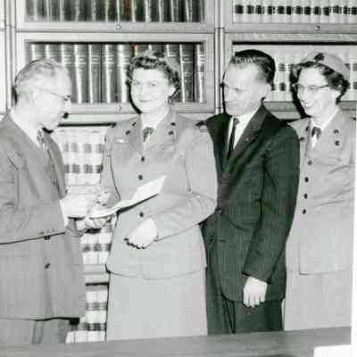 Katherine Howard of Ypsilanti installed as first president of Huron valley Area Girl Scouts May 1958