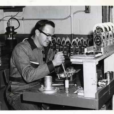 D.P.W working on parking meters.