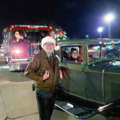 Firetruck and Model A car in parade