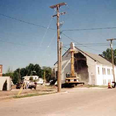 Tearing down Free Will Baptist Church for St. Marys addition. Picture taken from 3rd street looking north