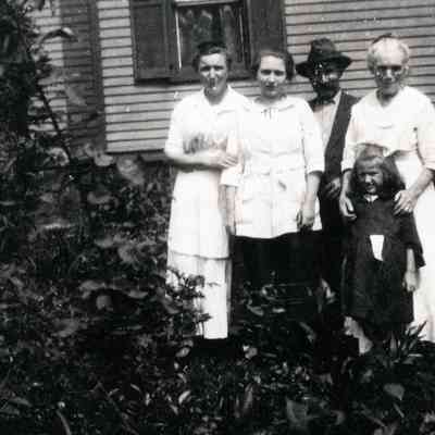 James and Annie Martin are standing on the right.