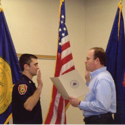 Firefighter being sworn in by City of Wayne Clerk