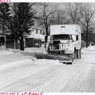 D.P.W Plowing Snow