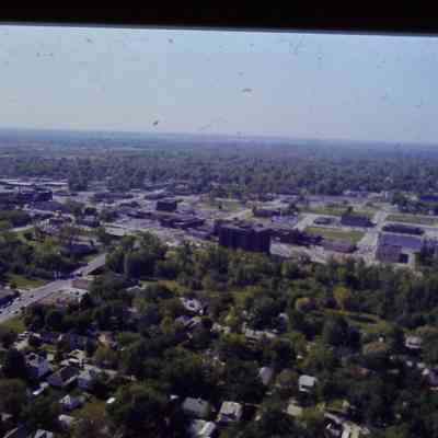 Aerial over tree streets and Wayne road looking SE