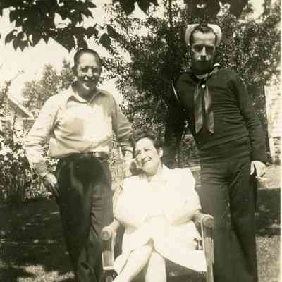 Mr. and Mrs. Eugene L'Huillier and Son, Donald L'Hullier. They lived at 2408 2nd St.