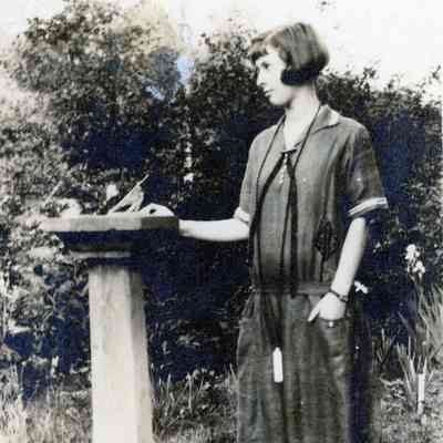 A women and sundial.
