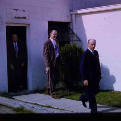 City officials walking out of DPW - 1956