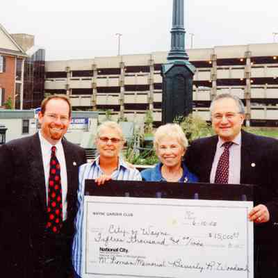 Garden Club Gifting Money to Wayne