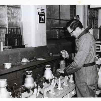 D.P.W working on parking meters.