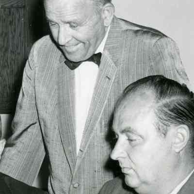 Don Howell, who is standing, was the postmaster of Wayne.