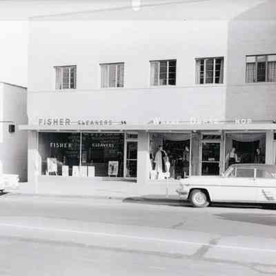 Stuarts, Fisher Cleaners, Wayne Dress Shop, Linda Lee. Historic facades removed, new modern one put up set back from road. Early 1950s.