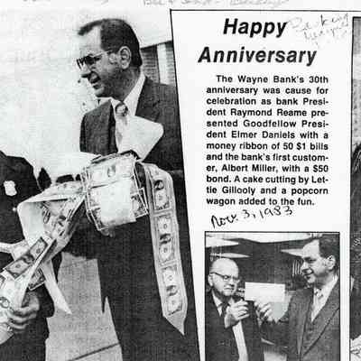 The Wayne Bank's 30th anniversary was cause for celebration as bank President Raymond Reame presented Goodfellow President Elmer Daniels with a money ribbon of 50 $1 bills and the bank's fist customer, Albert Miller, with a $50 bond. A cake cutting by Lettie Gillooly and a popcorn wagon added to the fun. Nov 3, 1983