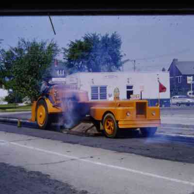 Paving in front of 35858 Michigan, Greyhound Bus Stop