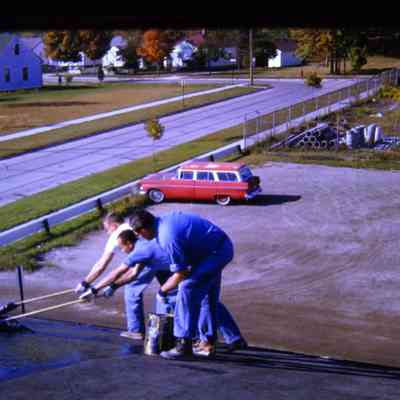 DPW Tarring Roof of DPW Building. October 1963.