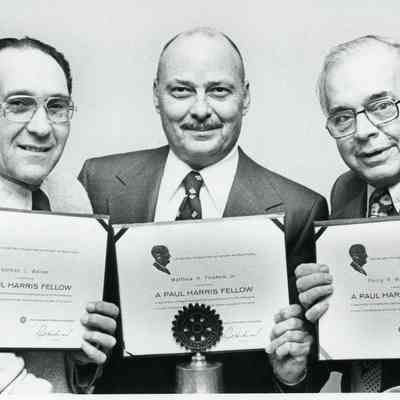 Rotary Members Receiving A Paul Harris Fellow Award