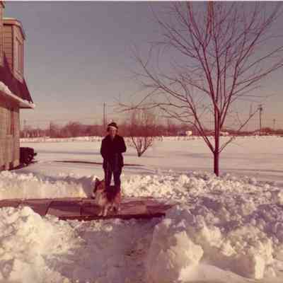Eileen Lekas at her house with her dog on 38945 Glenwood Ave in Wayne Michigan in the winter of 1975.