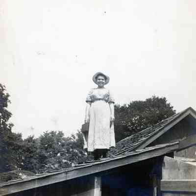 Ellen Martin on top of the Martin's chicken coop on Aug. 21, 1912.