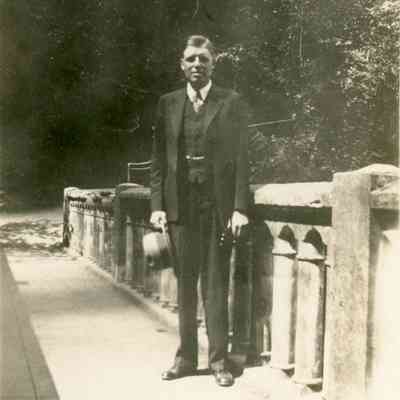 Rev. Walter Hegler on foot bridge half way up by Multnomal Hills on July of 1930.