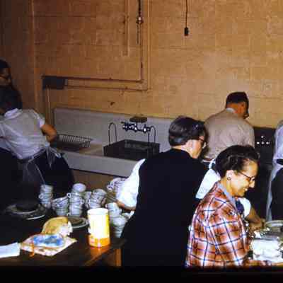 Men and women in the kitchen