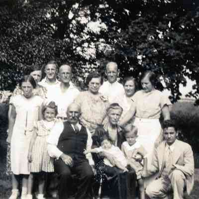 Ellen Martin is in middle of photo. James and Annie Martin are sitting in the front.