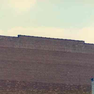 If you look closely you can see the sign "Shafer Theatre" at the roof line. West side of building