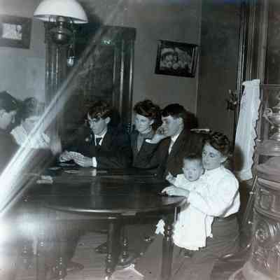 People playing cards on Oct. 20, 1907.