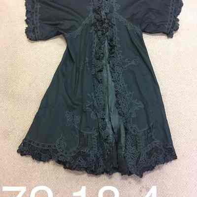 Black wrap lined with silk.