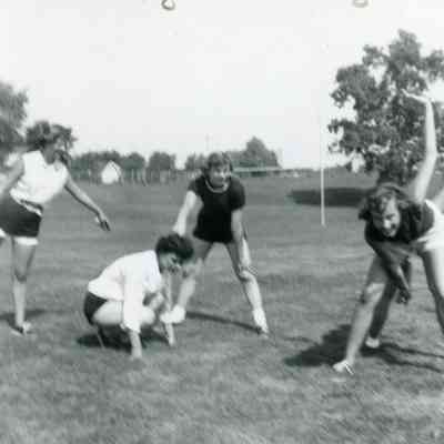 Marlene Bickel, Patti Bingel, Judy Lanczki and Pat Millar at Cheer Practice of August in 1954.