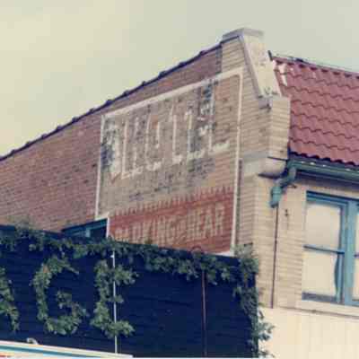 Roof of Jemieson Block with faded hotel advertising