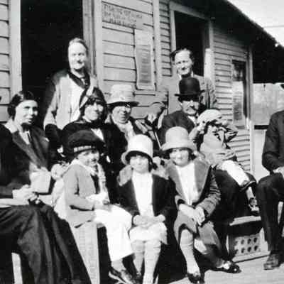Carpenter family next to store