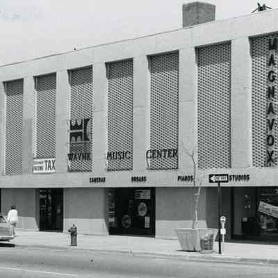 1975. Building covered with new modern facade at some point