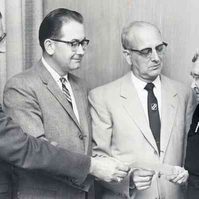 Wayne bank. Eagle photo. Ray Cramer, Laurence Weyand, Mrs. Tomage