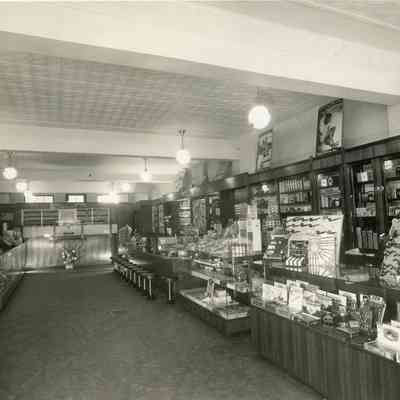 Northside Drug Store. Opened May 1, 1938 by Ward Garner and Ed Karznia. Later operated by John Campbell, 1958. Located at SE corner of Wayne road and Glenwood