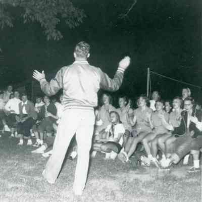 Newt at bonfire at the Midwest Cheerleads Camp at Smith & Walbridge in Syracuse, Indiana on June 19, 1953.