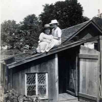 Ellen Martin and Annabell Erwin on top of the Martin's chicken coop on Aug. 21, 1912.