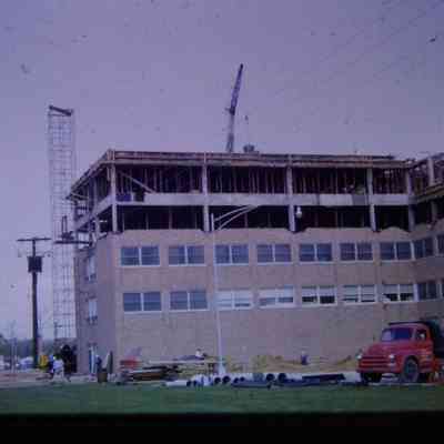 1962. Adding two new floors