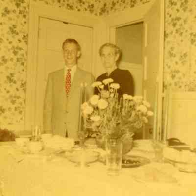 Billy Stoner and Mrs. Wheeler at Billy Stoner's Graduation Party on June 10, 1954.