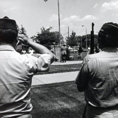 Veterans saluting Flag at Peace Memorial