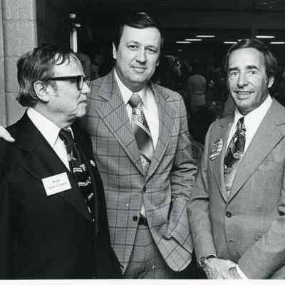 Tom Taylor is in the center of the Photo.