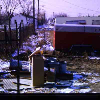 Alleys behind Michigan Ave EB businesses, east of town. South Side.